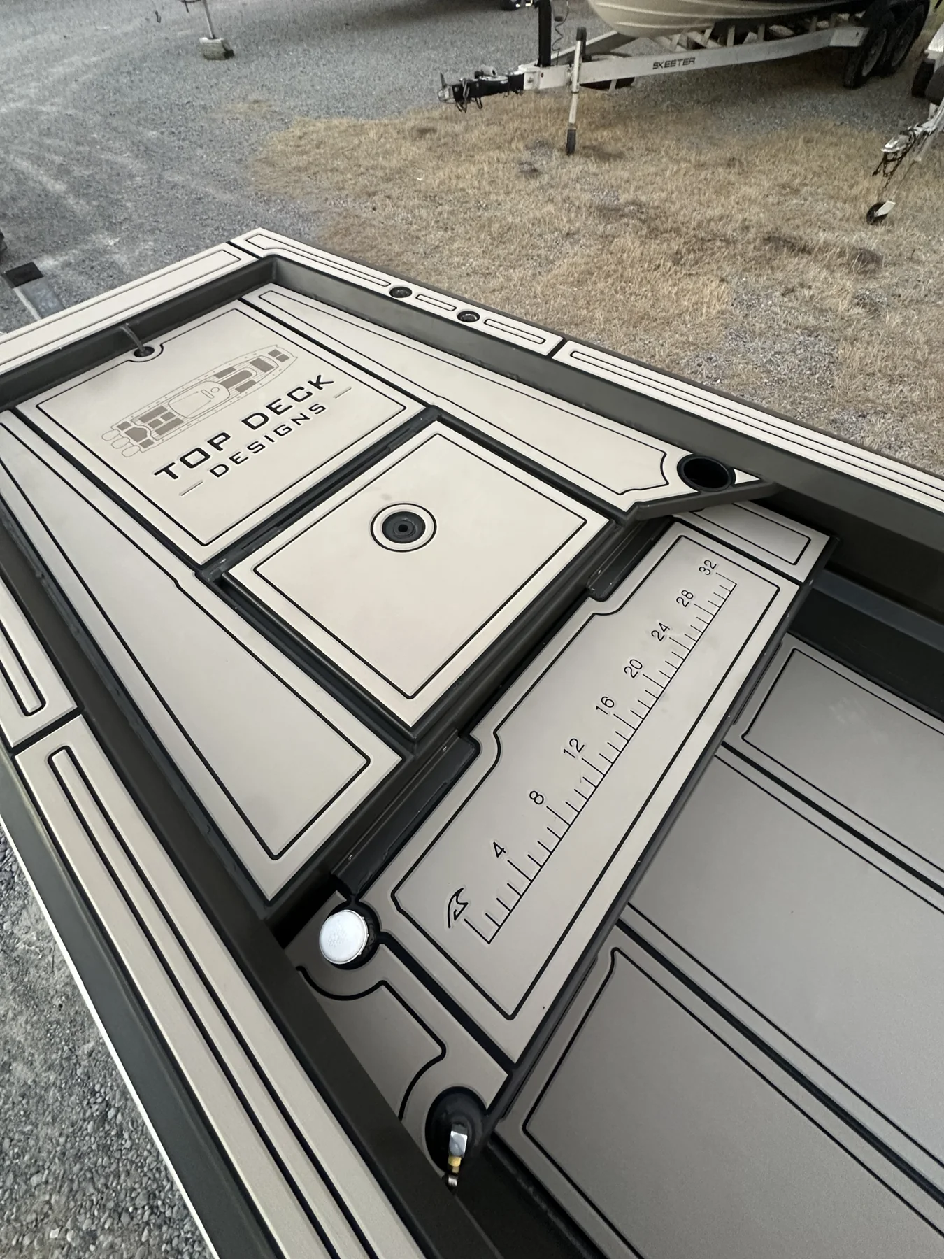 Custom Top Deck lettering, fitted hatch panels and an integrated fish ruler.